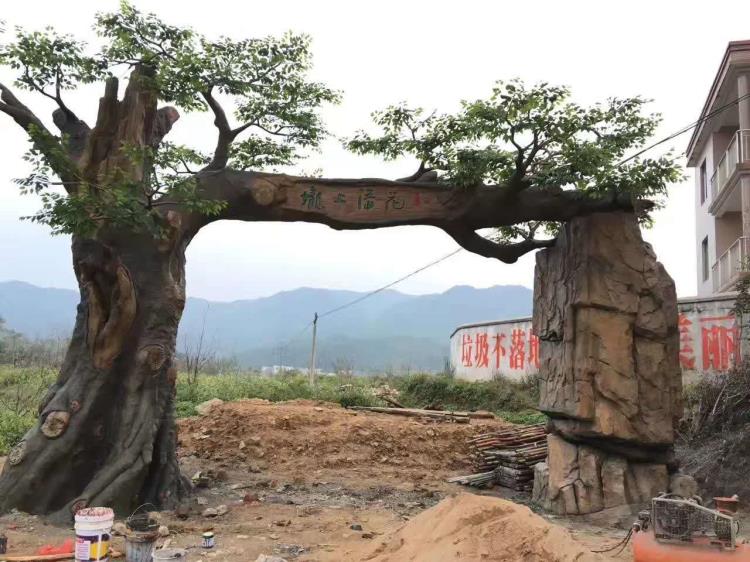 黑龙江游乐场仿生大门 农庄塑石假山大门设计施工价格